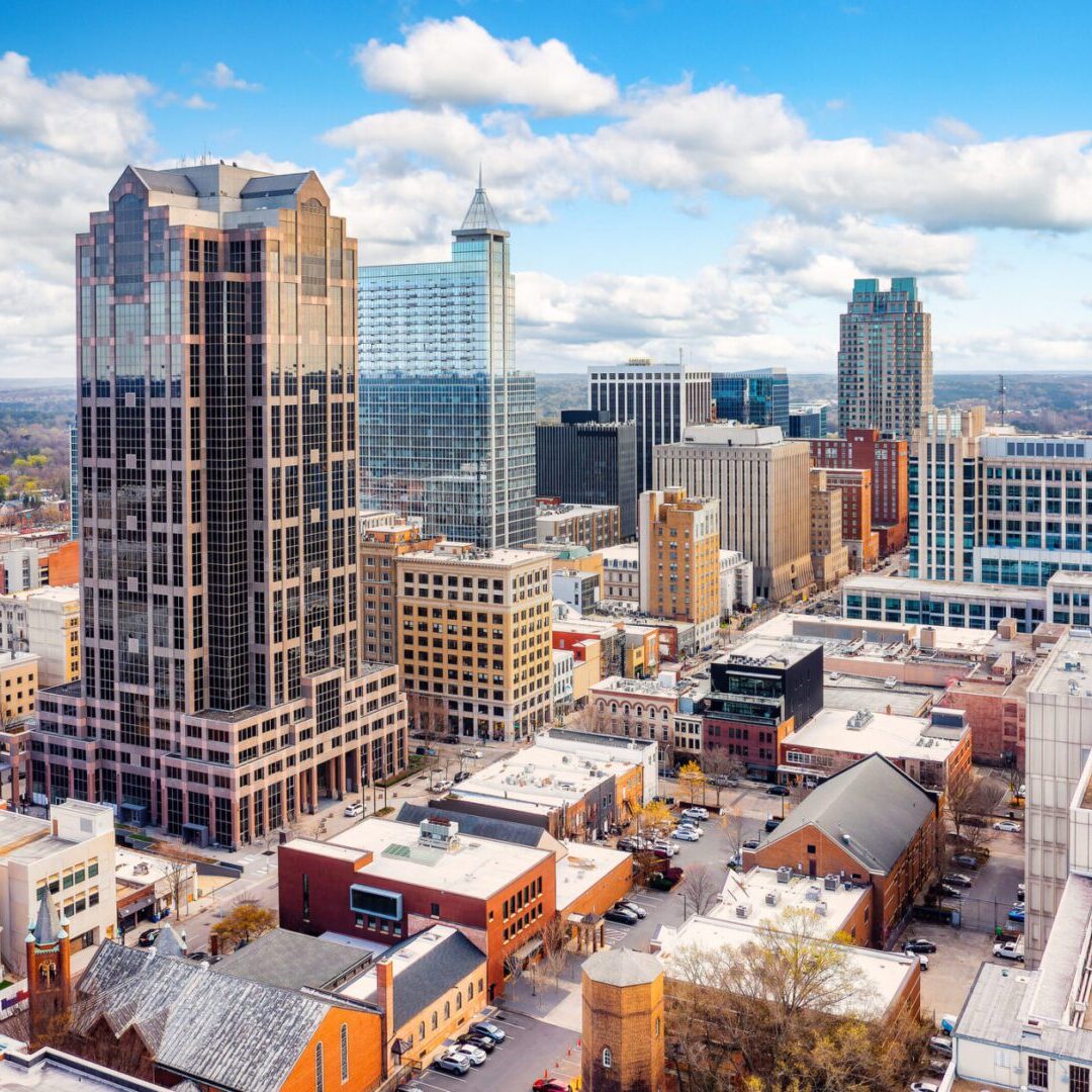 City skyline with tall buildings, daytime view.